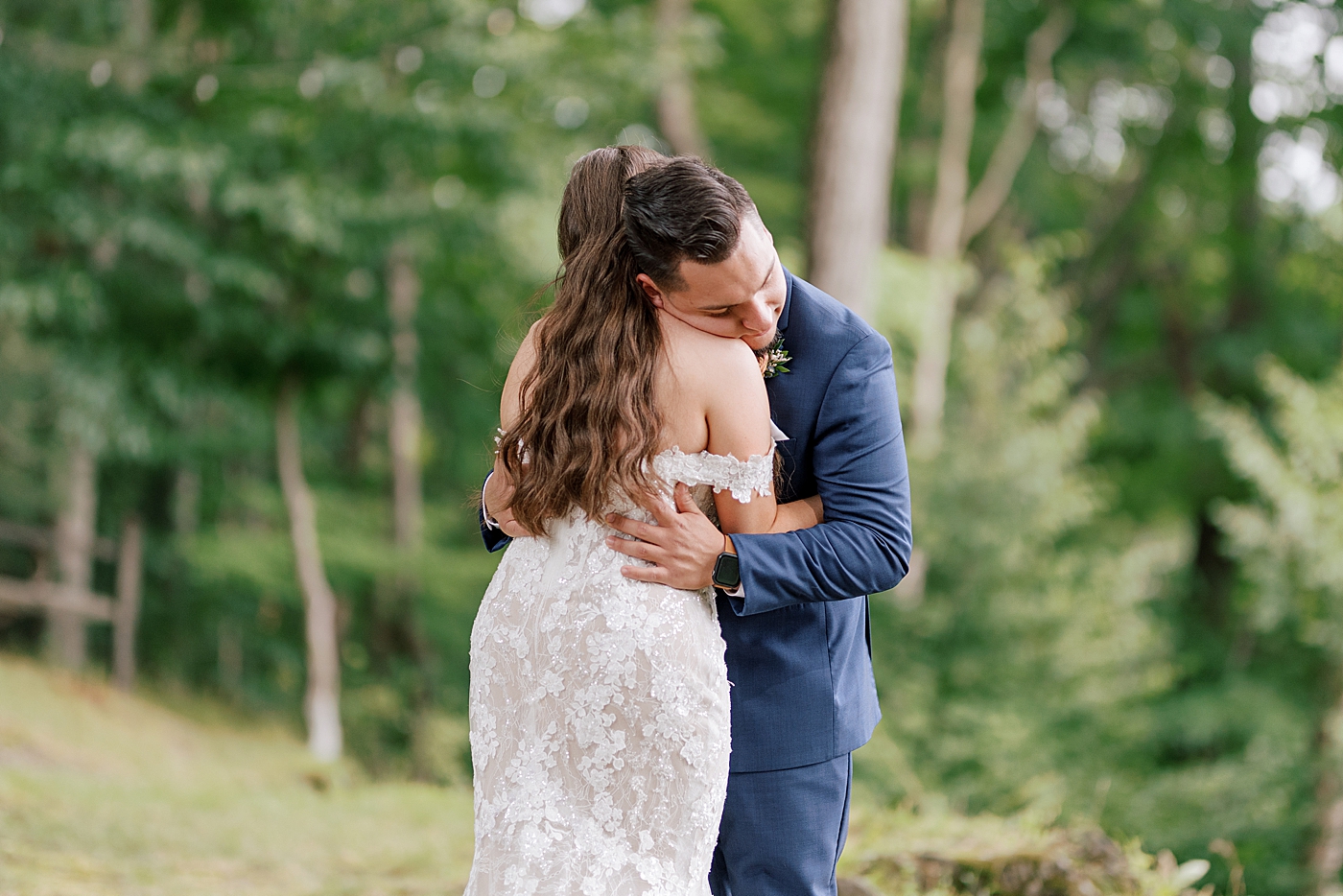 Bride and groom hugging after their first look | Image by Hope Helmuth Photography 