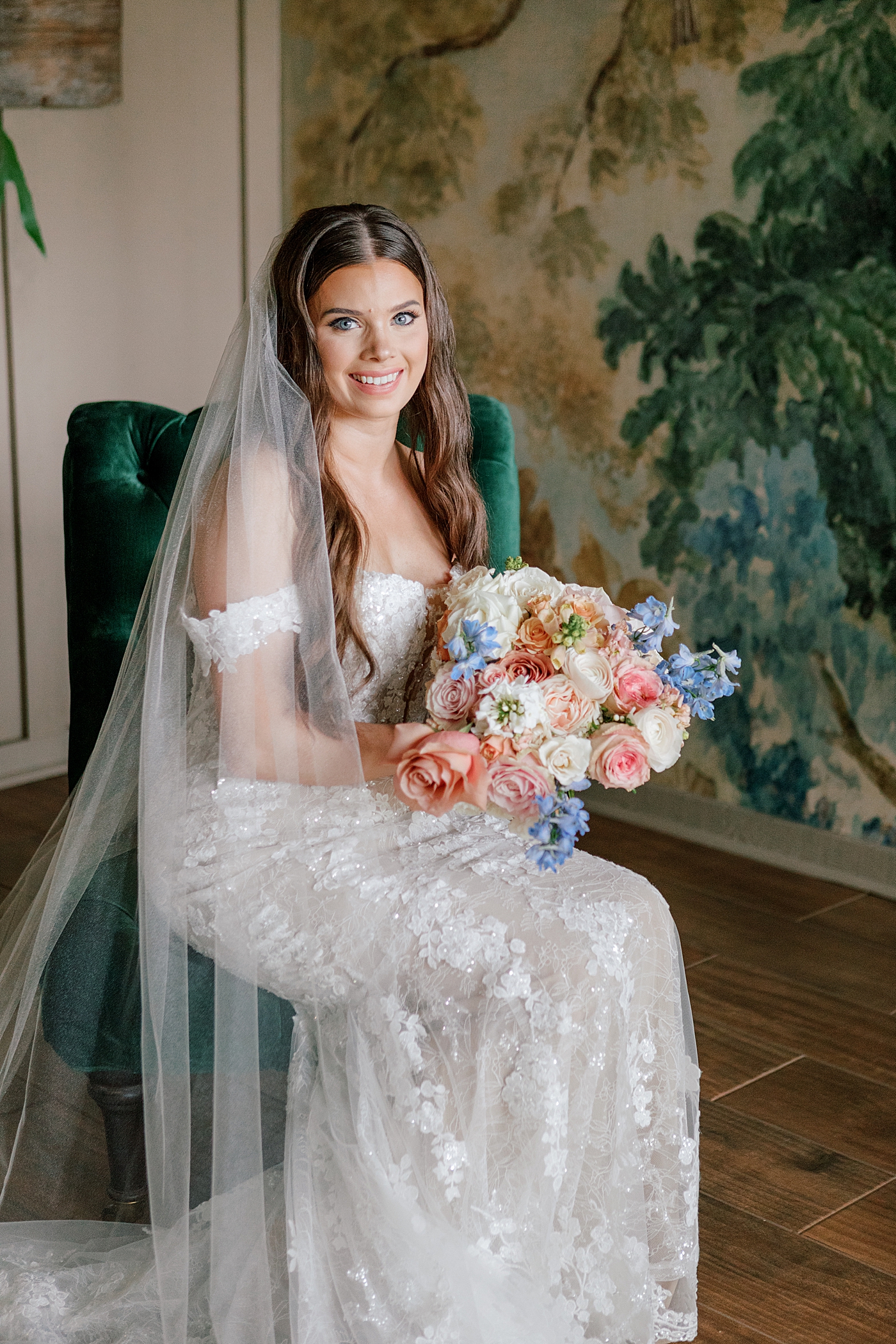 Bride sitting in a green chair | Image by Hope Helmuth Photography 