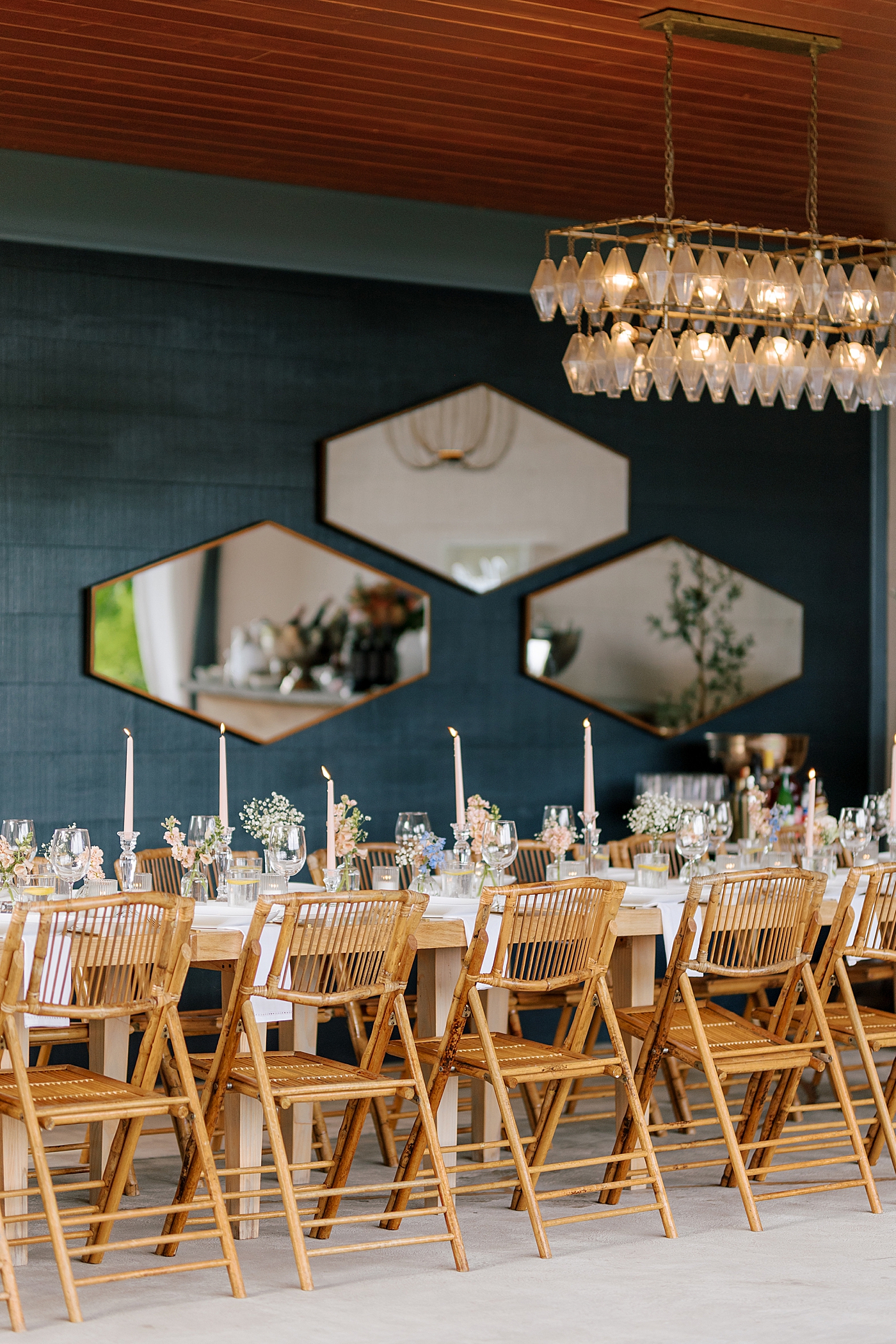 Details of wedding reception tables with mirrors, flowers and chairs during Promise Ridge Wedding | Image by Hope Helmuth Photography 