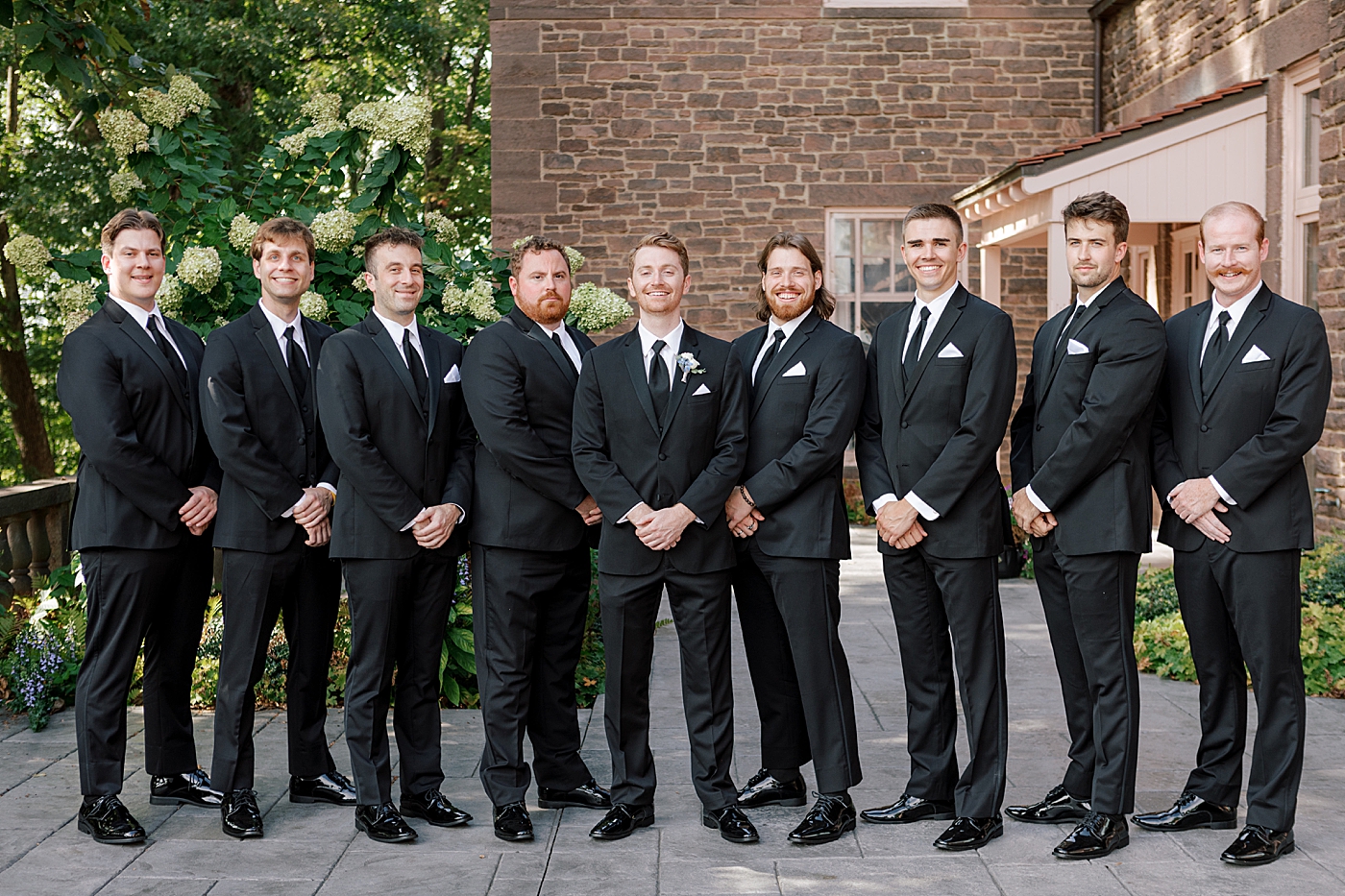 Groom and groomsmen during Tyler Gardens Wedding | Image by Hope Helmuth Photography
