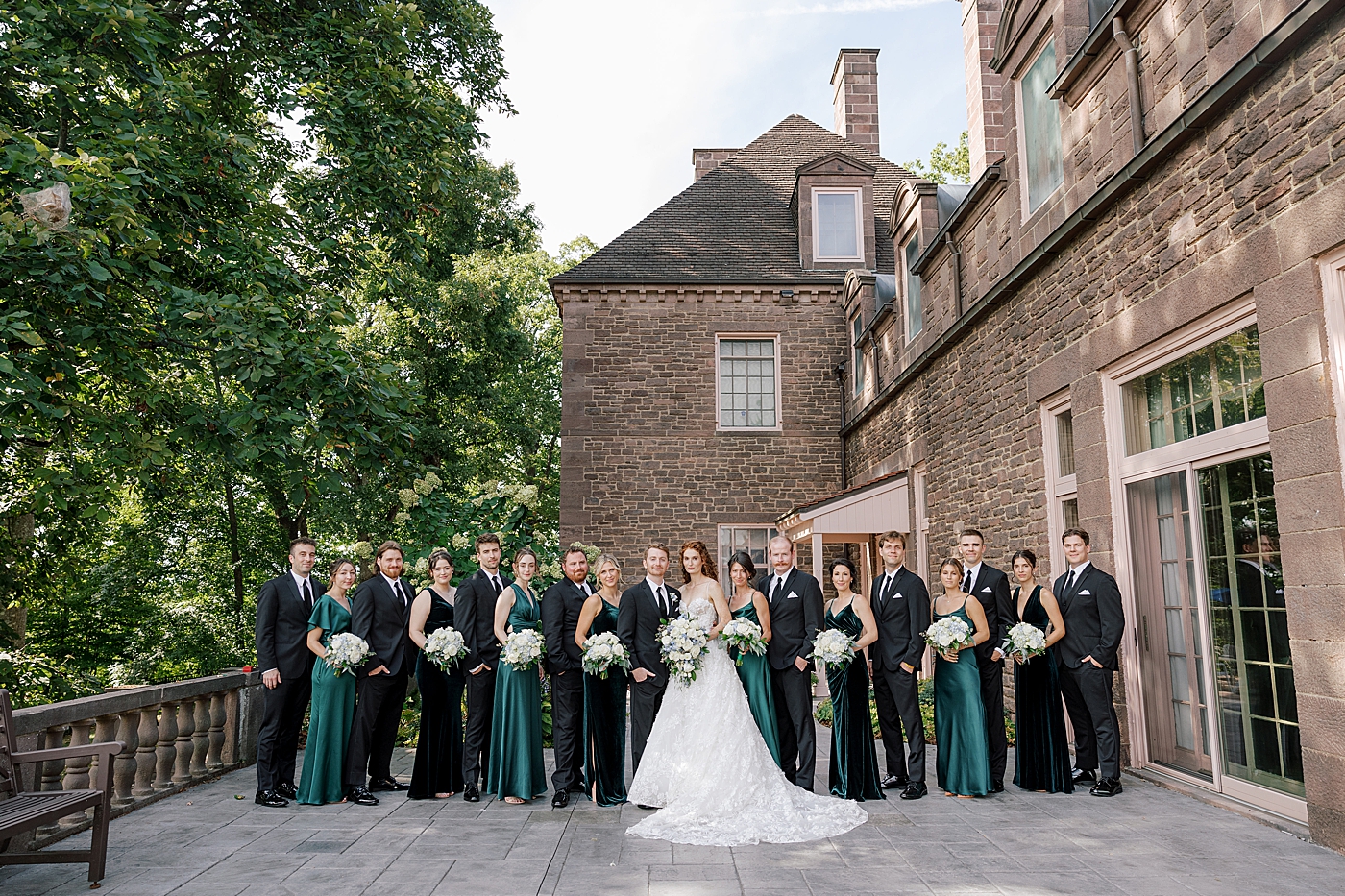 Wedding party with bride and groom during Tyler Gardens Wedding | Image by Hope Helmuth Photography