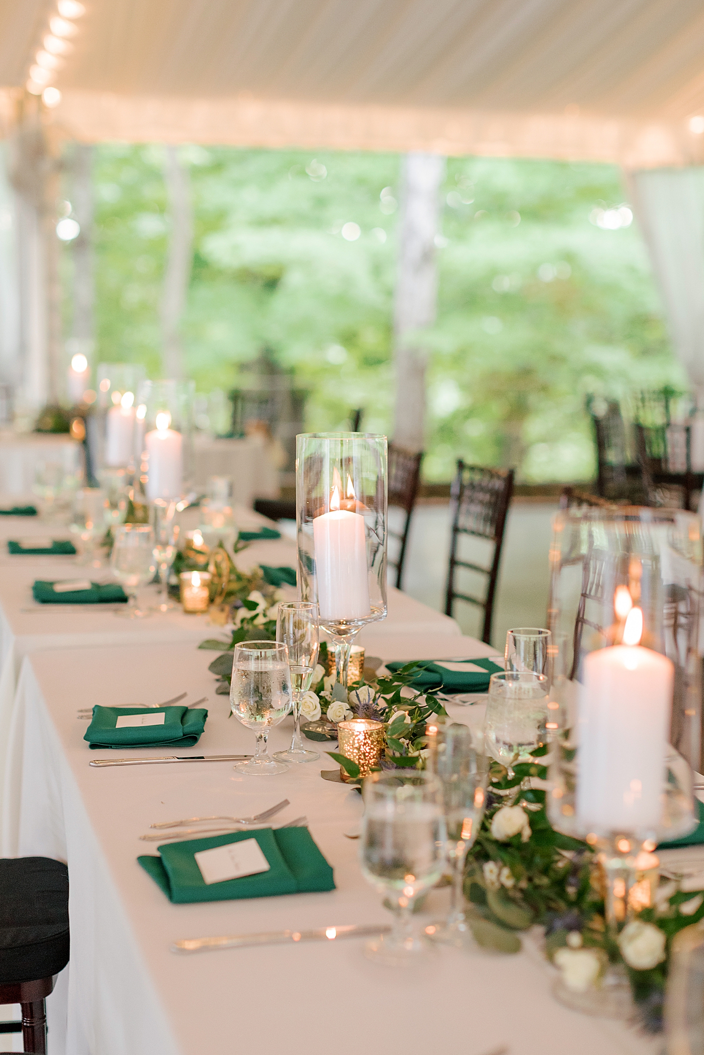 Green and white candlelit reception table details during Tyler Gardens Wedding | Image by Hope Helmuth Photography