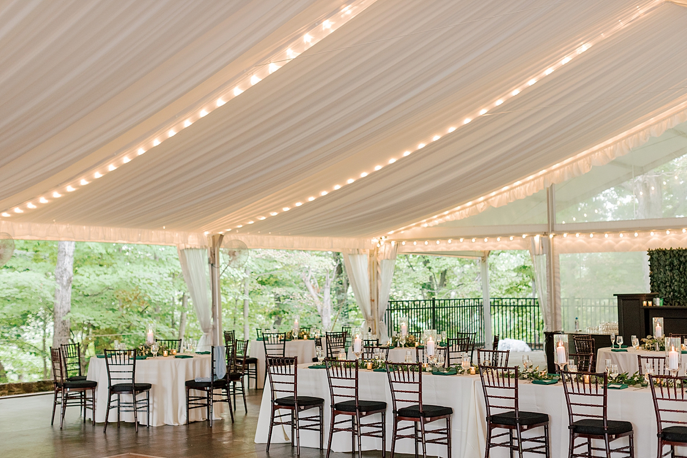 Green and white candlelit reception table details during Tyler Gardens Wedding | Image by Hope Helmuth Photography