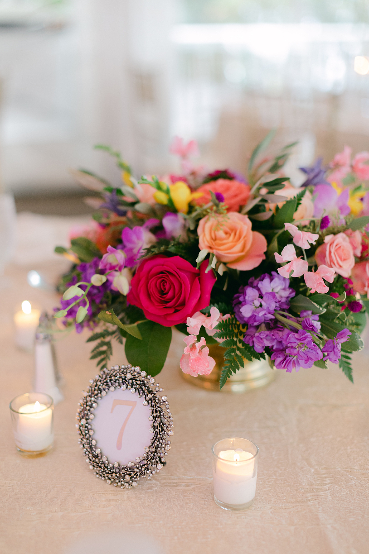 Reception table and floral details during their Sagamore Wedding | Image by Hope Helmuth Photography