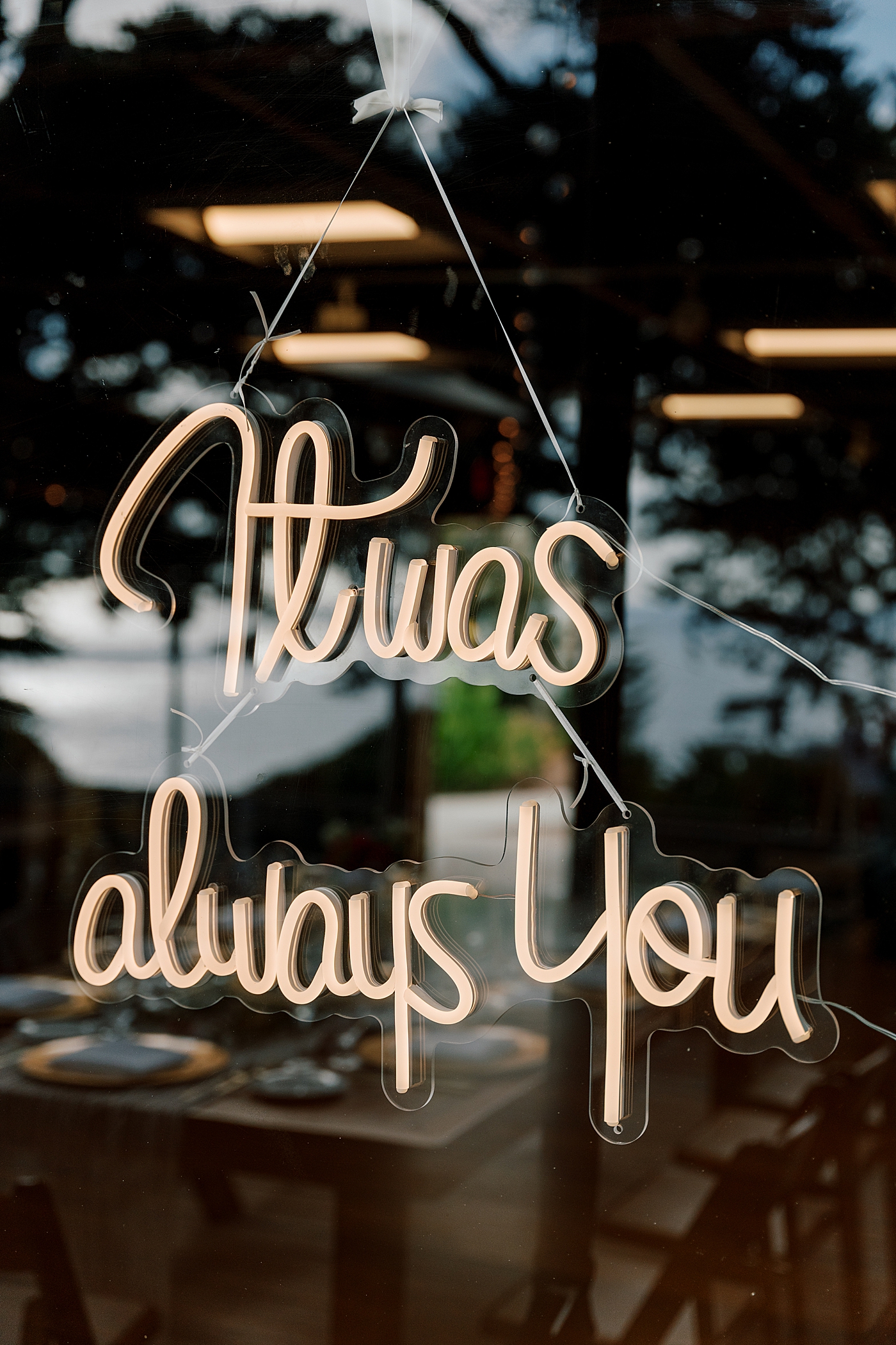 Detail of a wedding sign saying "It was always you" | Image by Hope Helmuth Photography