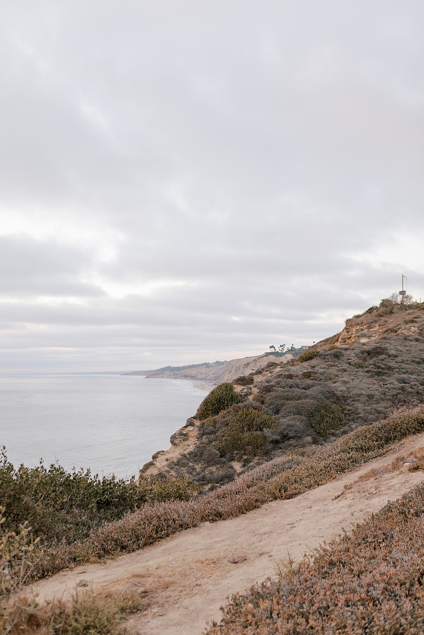 Landscape image of a seaside path at sunset | Image by San Diego Wedding Photographer Hope Helmuth