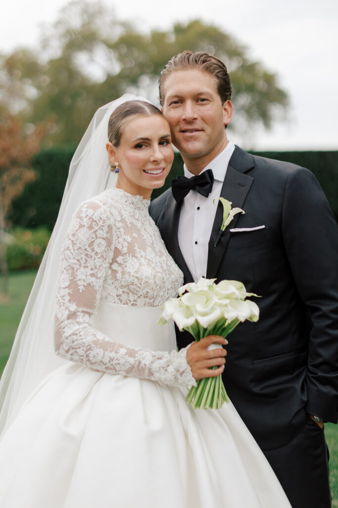 Classic-Waterfront-Tented-Wedding-hope-helmuth-23 high fashion bridal gown with lac and long sleeves