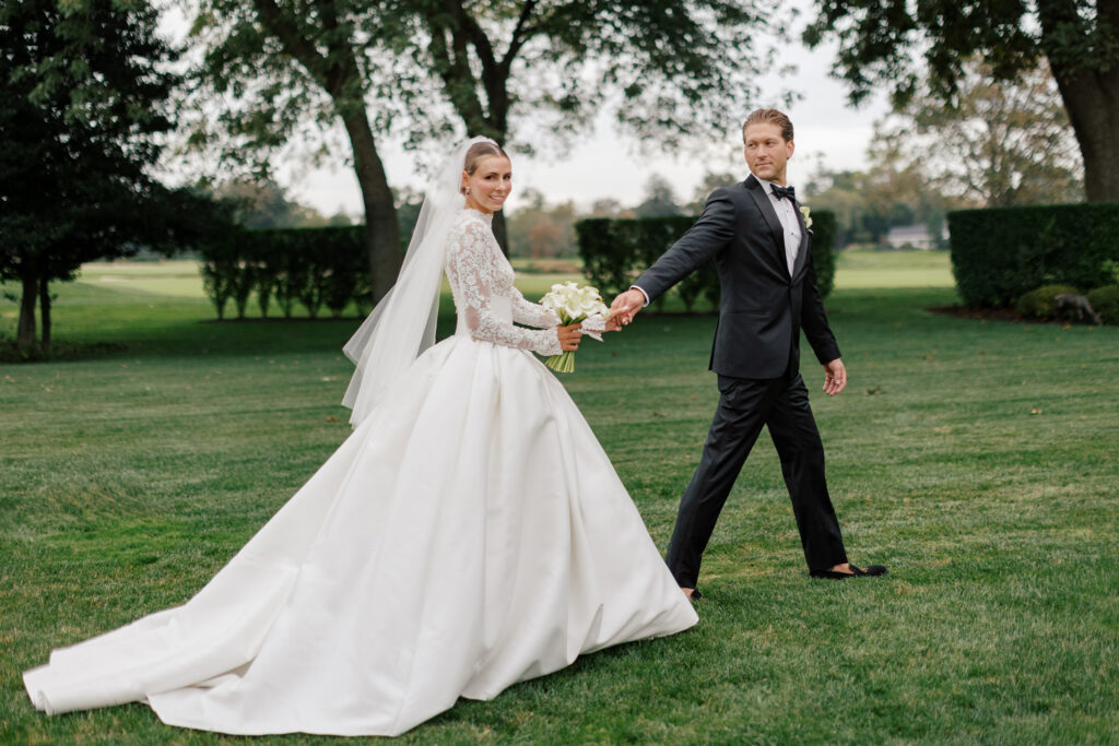 Classic-Waterfront-Tented-Wedding-hope-helmuth-27 high fashion bridal gown with lac and long sleeves